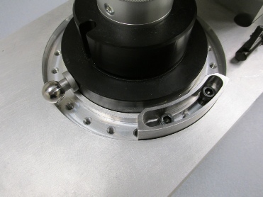 Spring Torque Fixture: The tooling ball rotates a set number of degrees to hit the stop, for the spring being tested. 